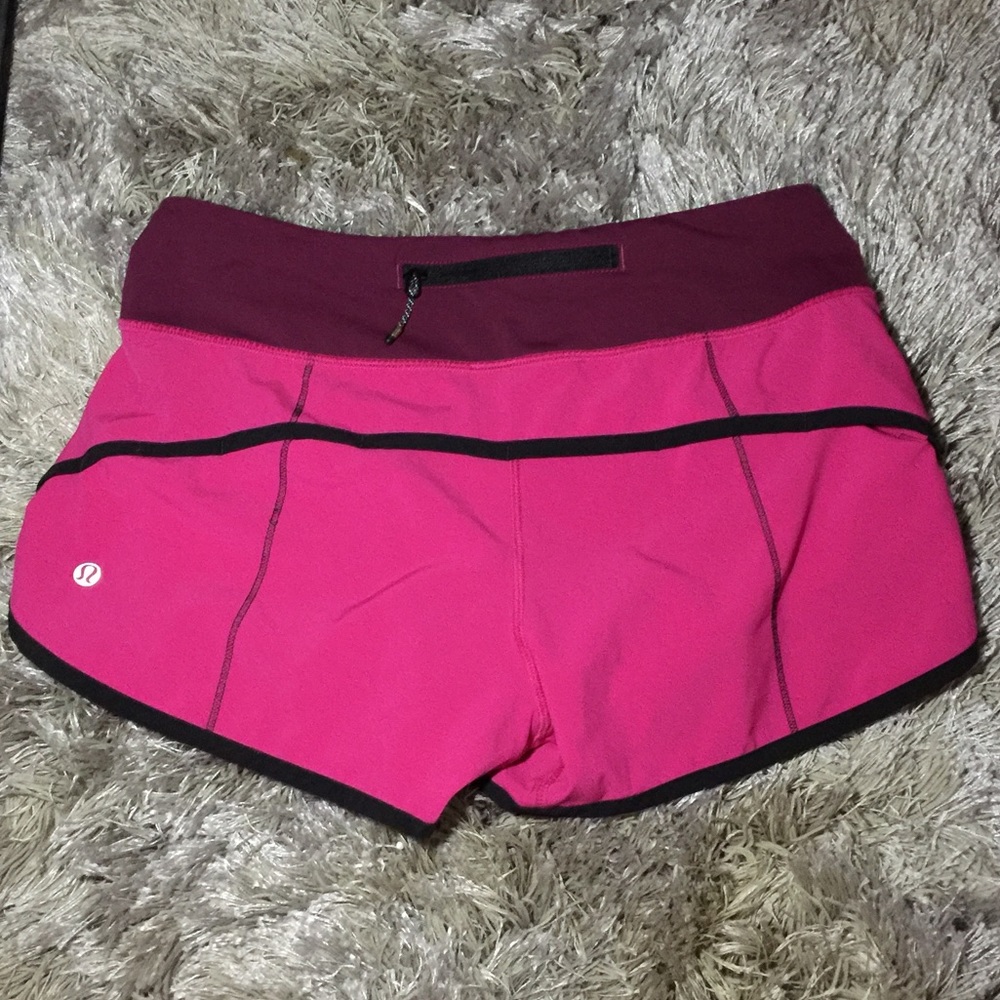 PINK AND PURPLE LULULEMON SPEED UP SHORTS